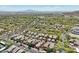 Expansive aerial view of a meticulously planned residential neighborhood featuring lush green landscaping at 21155 W Green St, Buckeye, AZ 85396