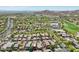 A home pinpoints the location within a lovely, well-maintained neighborhood surrounded by a golf course and desert landscape at 21155 W Green St, Buckeye, AZ 85396