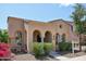 Attractive single-story home with tile roof, stucco exterior, and neat landscaping at 21155 W Green St, Buckeye, AZ 85396