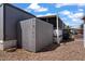 Home exterior featuring shed, privacy fence and low maintenance yard at 2121 N Center St # 166, Mesa, AZ 85201