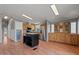 Spacious kitchen featuring wood cabinets, an island, and stainless steel appliances at 2121 N Center St # 166, Mesa, AZ 85201