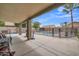 Backyard with a covered patio, a fenced pool, and a grill area for outdoor enjoyment at 2343 E Kempton Rd, Chandler, AZ 85225