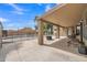 Inviting outdoor space with covered patio, built-in fire pit, and fenced pool at 2343 E Kempton Rd, Chandler, AZ 85225