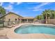 Backyard showcasing a pool, lounge chairs, and a well-maintained outdoor area at 2343 E Kempton Rd, Chandler, AZ 85225