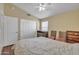 Comfortable bedroom featuring vaulted ceilings, ample closet space, and natural light at 2343 E Kempton Rd, Chandler, AZ 85225