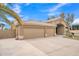 Well-maintained single-story home with three-car garage and desert landscaping at 2343 E Kempton Rd, Chandler, AZ 85225
