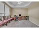 Bright office space with a large window, desk setup, and built-in wooden drawers at 2343 E Kempton Rd, Chandler, AZ 85225