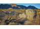 A scenic view showcases the beauty of the high desert landscape, surrounded by mountains at 24422 N 128Th Way, Scottsdale, AZ 85255