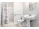 Bathroom featuring a shower and a white pedestal sink at 2502 N 22Nd Dr, Phoenix, AZ 85009