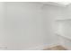 An empty, all-white closet with shelf storage at 2502 N 22Nd Dr, Phoenix, AZ 85009