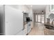 Bright kitchen featuring white cabinetry, granite countertops, and modern appliances at 2502 N 22Nd Dr, Phoenix, AZ 85009