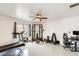 Well-equipped home gym with treadmill, weight rack, and ample space for exercise at 2609 N Pleasant Dr, Chandler, AZ 85225