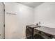 Bright laundry room featuring modern washer and dryer units and convenient wall hooks at 2609 N Pleasant Dr, Chandler, AZ 85225