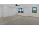 Bright and spacious bedroom with decorative wall molding and large windows at 26631 S 169Th Pl, Queen Creek, AZ 85142