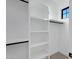 Walk in closet with custom shelving at 26631 S 169Th Pl, Queen Creek, AZ 85142