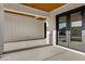 Inviting covered patio with stone accents and stylish wood ceiling at 26631 S 169Th Pl, Queen Creek, AZ 85142