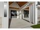 Spacious covered patio boasting stylish lighting and gray stone accents at 26631 S 169Th Pl, Queen Creek, AZ 85142