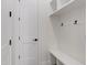Mudroom features built-in bench, coat hooks, and storage in a modern design at 26631 S 169Th Pl, Queen Creek, AZ 85142
