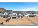 New home exterior showcasing modern design, white paint, and block fence at 26631 S 169Th Pl, Queen Creek, AZ 85142