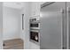 Kitchen appliance wall featuring stainless steel refrigerator, oven, and microwave appliances at 26631 S 169Th Pl, Queen Creek, AZ 85142
