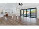 Living room with an island kitchen and sliding glass door at 26631 S 169Th Pl, Queen Creek, AZ 85142