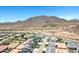 Picturesque aerial view captures a residential community with beautiful desert mountain views at 26643 S 169Th Pl, Queen Creek, AZ 85142