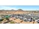 New homes under construction feature pools with a backdrop of stunning desert mountain scenery at 26643 S 169Th Pl, Queen Creek, AZ 85142