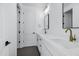 Elegant bathroom featuring a double vanity, gold fixtures, and modern design at 26643 S 169Th Pl, Queen Creek, AZ 85142