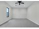 Spacious bedroom with neutral carpet, modern ceiling fan and designer trim at 26643 S 169Th Pl, Queen Creek, AZ 85142