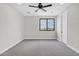 Well lit bedroom featuring large window providing stunning view of landscape at 26643 S 169Th Pl, Queen Creek, AZ 85142
