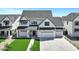 Charming two-story home featuring a three-car garage and well-manicured front lawn at 26643 S 169Th Pl, Queen Creek, AZ 85142