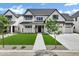 Charming new construction home with a manicured lawn, long driveway, and a three car garage at 26643 S 169Th Pl, Queen Creek, AZ 85142