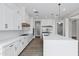 Spacious modern kitchen with stainless steel appliances, quartz counters and white cabinets at 26643 S 169Th Pl, Queen Creek, AZ 85142