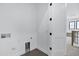 Neat laundry room with tile floors, featuring hookups, and access to the home's interior at 26643 S 169Th Pl, Queen Creek, AZ 85142