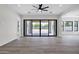 Bright living room with large sliding glass doors to the patio at 26643 S 169Th Pl, Queen Creek, AZ 85142