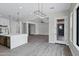 Open-concept living space featuring an island kitchen and views to other areas of the home at 26643 S 169Th Pl, Queen Creek, AZ 85142