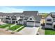 Charming new construction homes featuring modern farmhouse exteriors and manicured lawns at 26643 S 169Th Pl, Queen Creek, AZ 85142