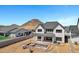 New home construction in a desert environment with an in-progress backyard pool at 26655 S 169Th Pl, Queen Creek, AZ 85142