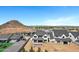 New home construction showing mountain views and in-progress backyard pool installation at 26655 S 169Th Pl, Queen Creek, AZ 85142