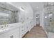 Luxurious bathroom with a double vanity, premium finishes, and a large glass-enclosed shower at 26655 S 169Th Pl, Queen Creek, AZ 85142