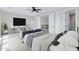 Inviting bedroom featuring a TV, lounge chairs, and decorative dresser at 26655 S 169Th Pl, Queen Creek, AZ 85142