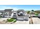 Beautiful two-story home with modern farmhouse design, well manicured lawn, and ample parking space at 26655 S 169Th Pl, Queen Creek, AZ 85142