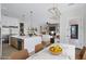 Open-concept kitchen and dining area flows into the living room, creating a perfect space for entertaining at 26655 S 169Th Pl, Queen Creek, AZ 85142