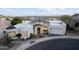 Scenic neighborhood home featuring a private yard, attached garage and lush desert landscaping at 27 W Cochise Dr, Phoenix, AZ 85021
