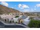 Charming neighborhood home with mountain views, an attached garage, and lush desert landscaping at 27 W Cochise Dr, Phoenix, AZ 85021
