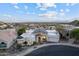 Expansive view of a charming home in a desert community with city views at 27 W Cochise Dr, Phoenix, AZ 85021