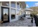Stunning outdoor patio with panoramic views, featuring a seating area, water feature, and modern design at 27 W Cochise Dr, Phoenix, AZ 85021