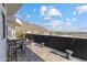 Balcony with mountain view features patio set, with tile floor and privacy fence at 27 W Cochise Dr, Phoenix, AZ 85021