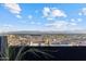 City view from balcony, showcasing skyline from behind decorative privacy fence at 27 W Cochise Dr, Phoenix, AZ 85021