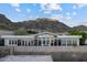 Stylish home with floor-to-ceiling windows offering stunning mountain views at 27 W Cochise Dr, Phoenix, AZ 85021